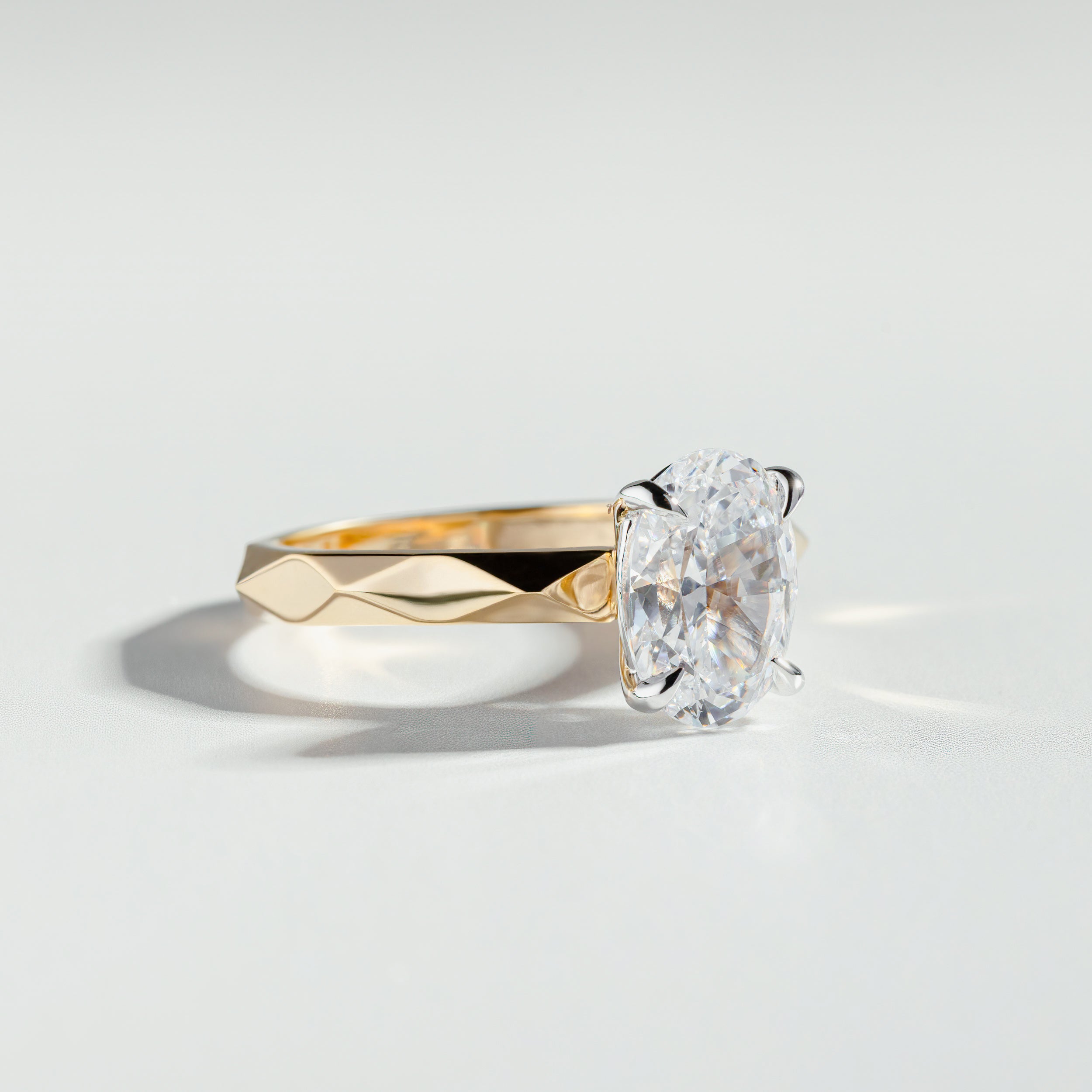 The Oval Cut Two-Tone Geometric Diamond Ring