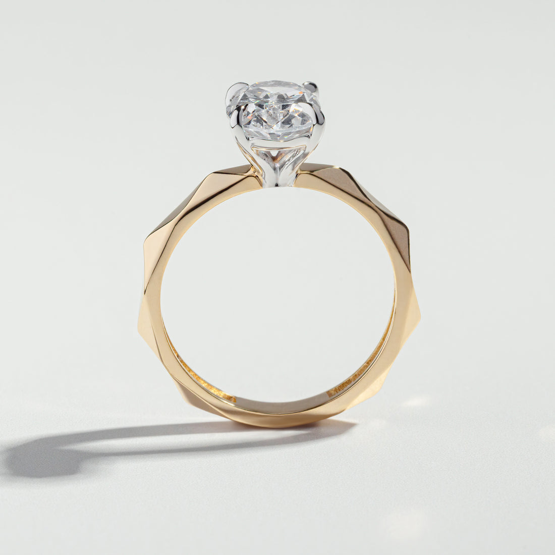 The Oval Cut Two-Tone Geometric Diamond Ring