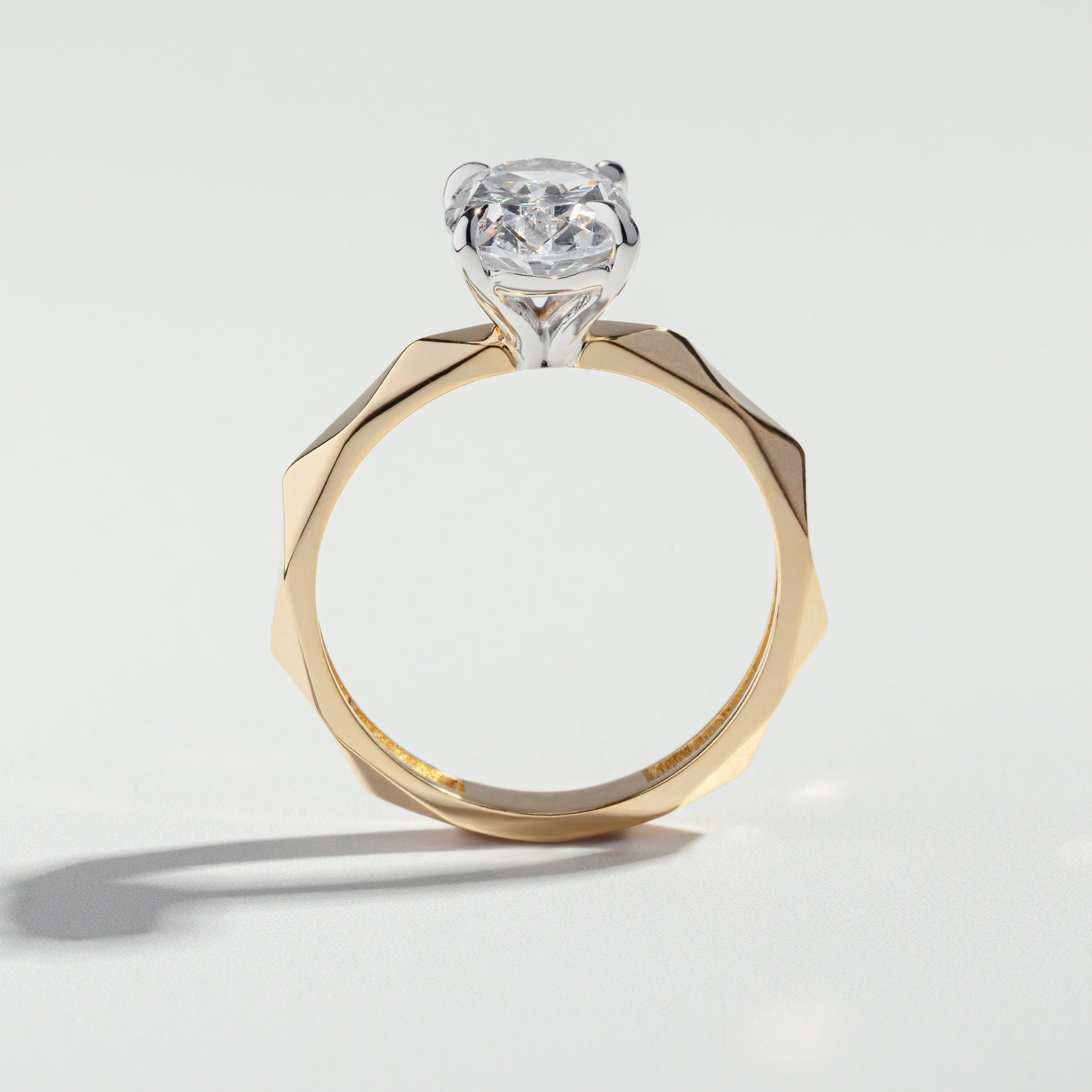 The Oval Cut Two-Tone Geometric Diamond Ring