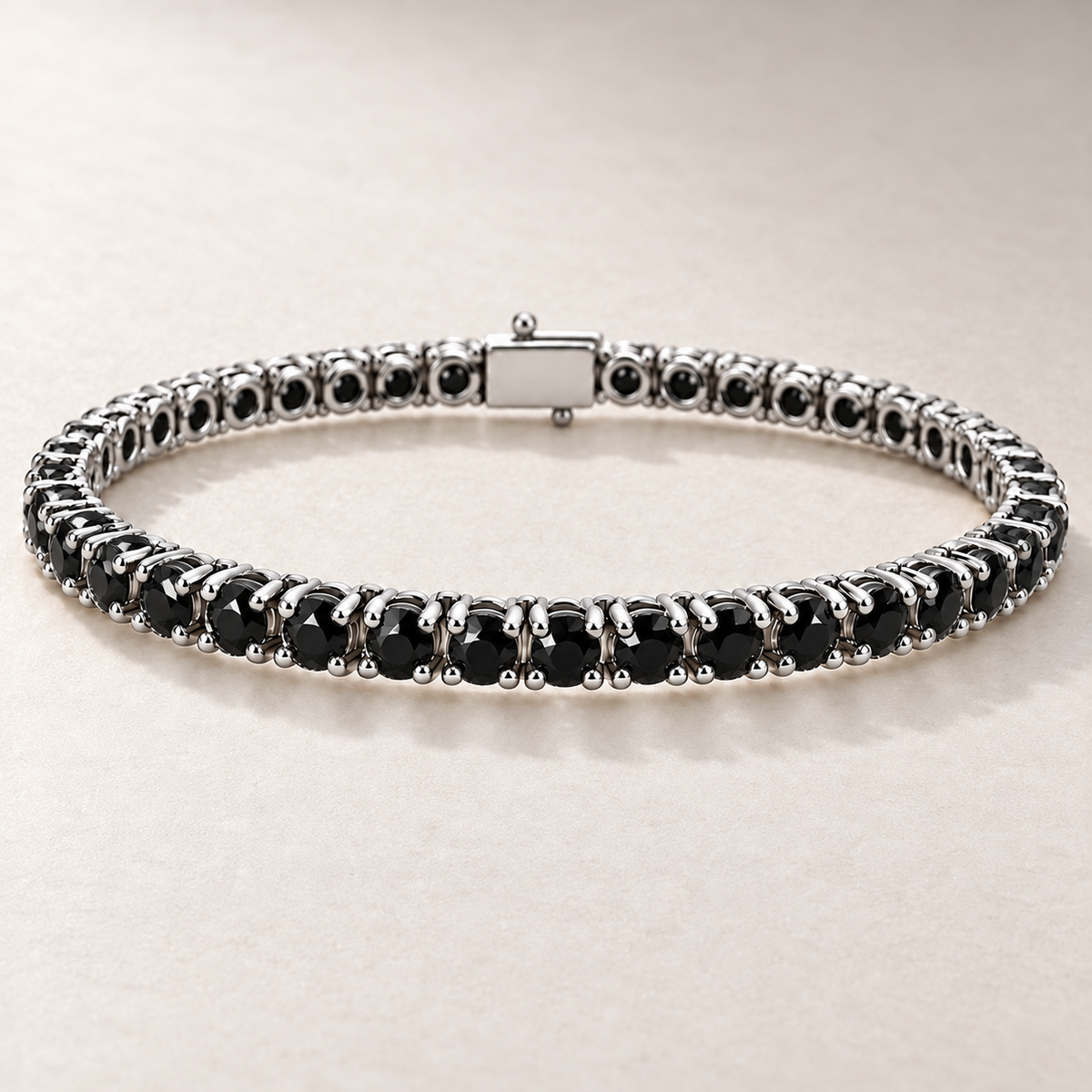 Bracelet TN08 en or blanc, diamants noirs, fond pierre greige — TN08 white gold bracelet with black diamonds on greige stone.