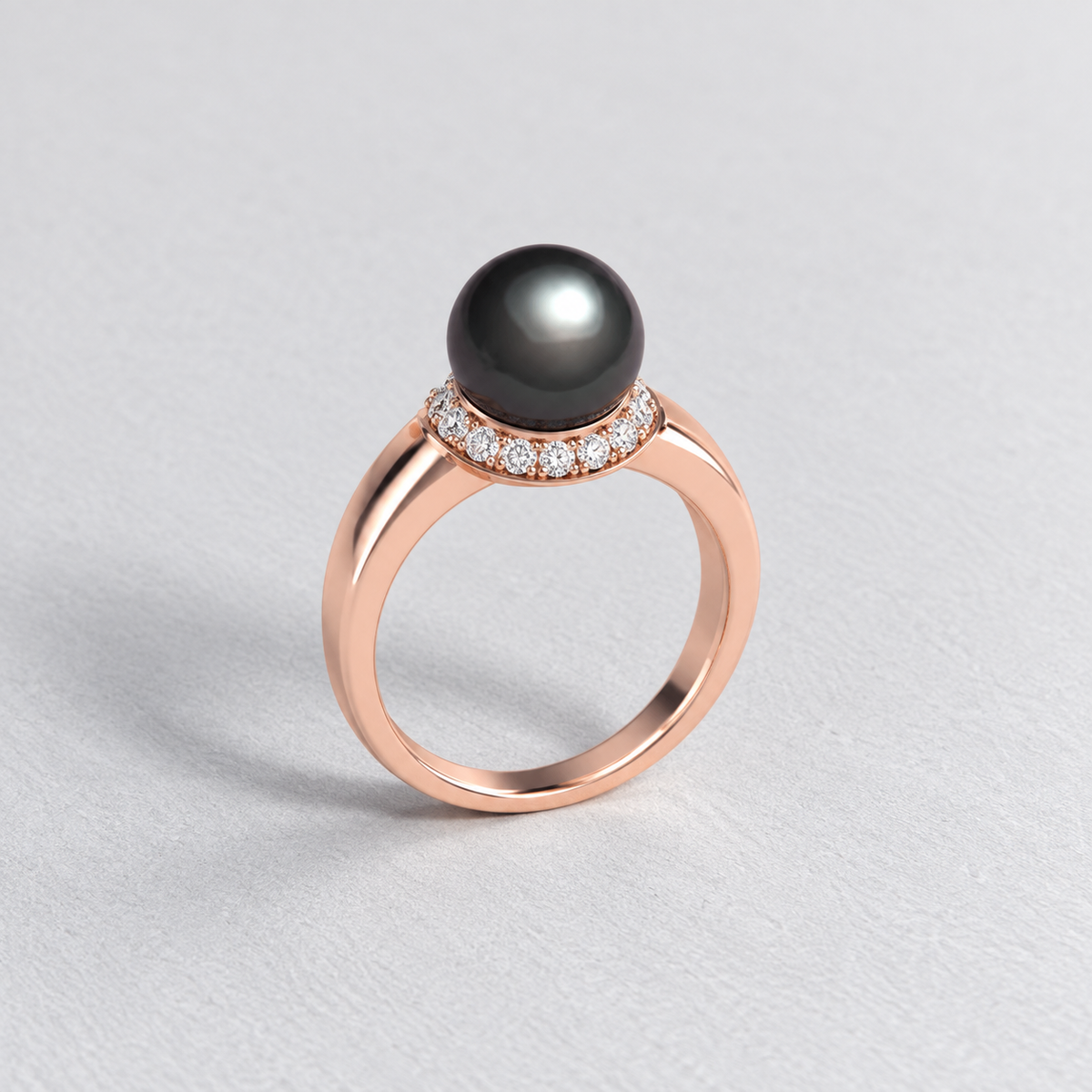 Bague en or avec perle de Tahiti et halo de diamants