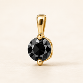 P371 — 6,5 mm — Noir naturel traité — Or jaune
