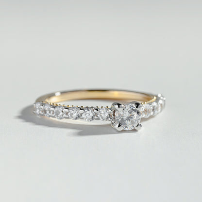 The Round Cut Shared Prong Pavé Ring