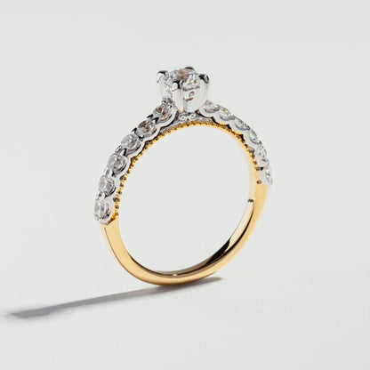 The Round Cut Shared Prong Pavé Ring