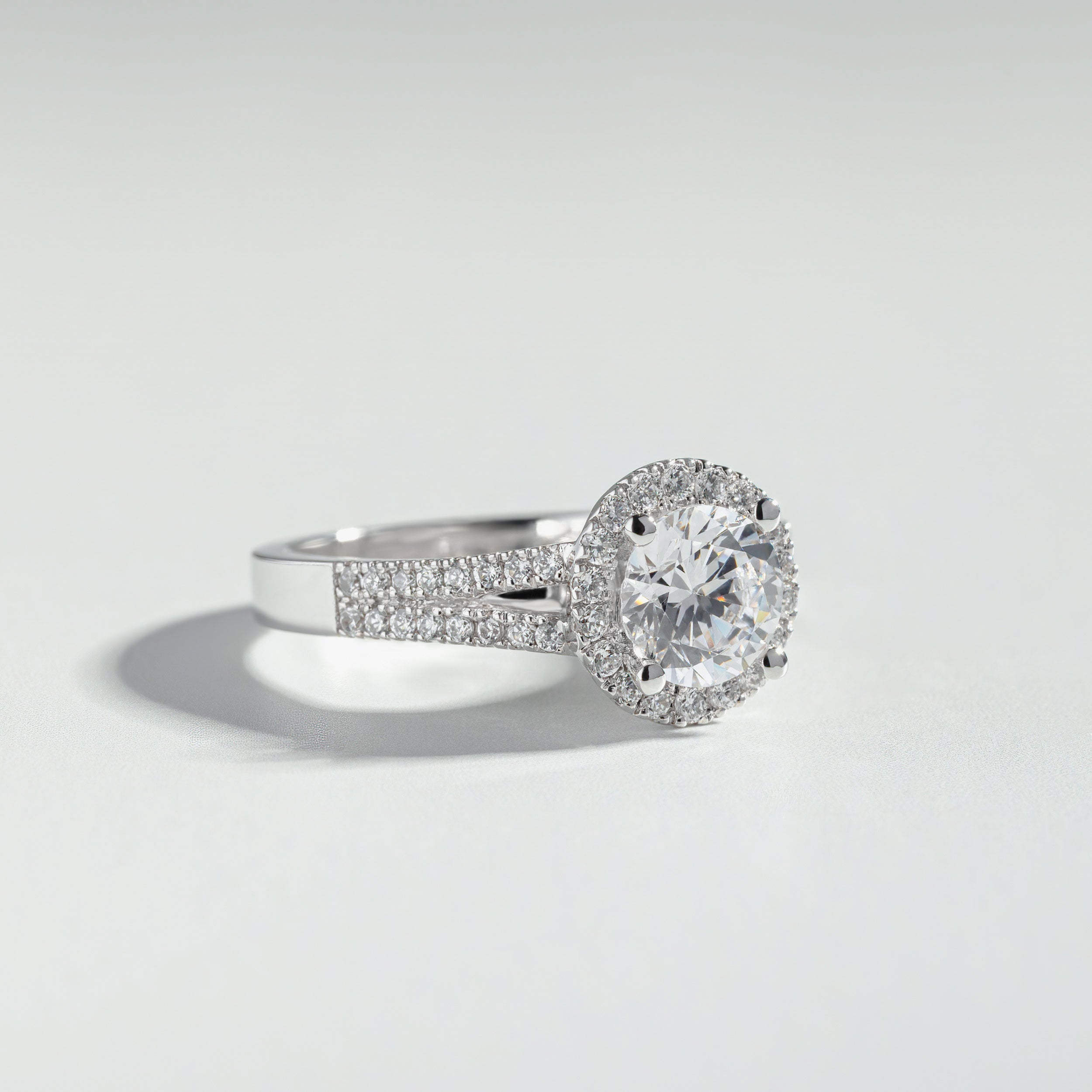 The Round Cut Halo Basket and Pavé Ring