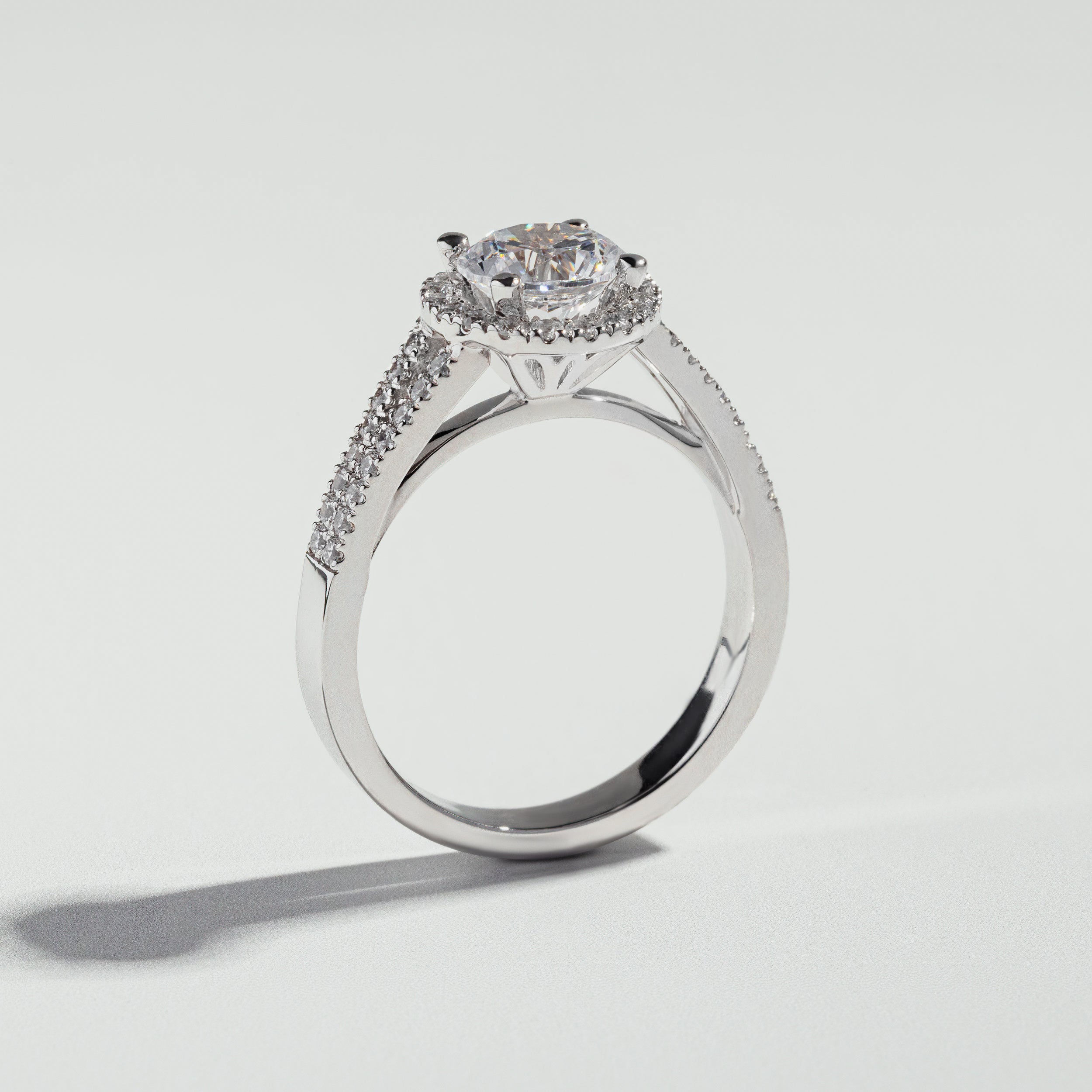 The Round Cut Halo Basket and Pavé Ring