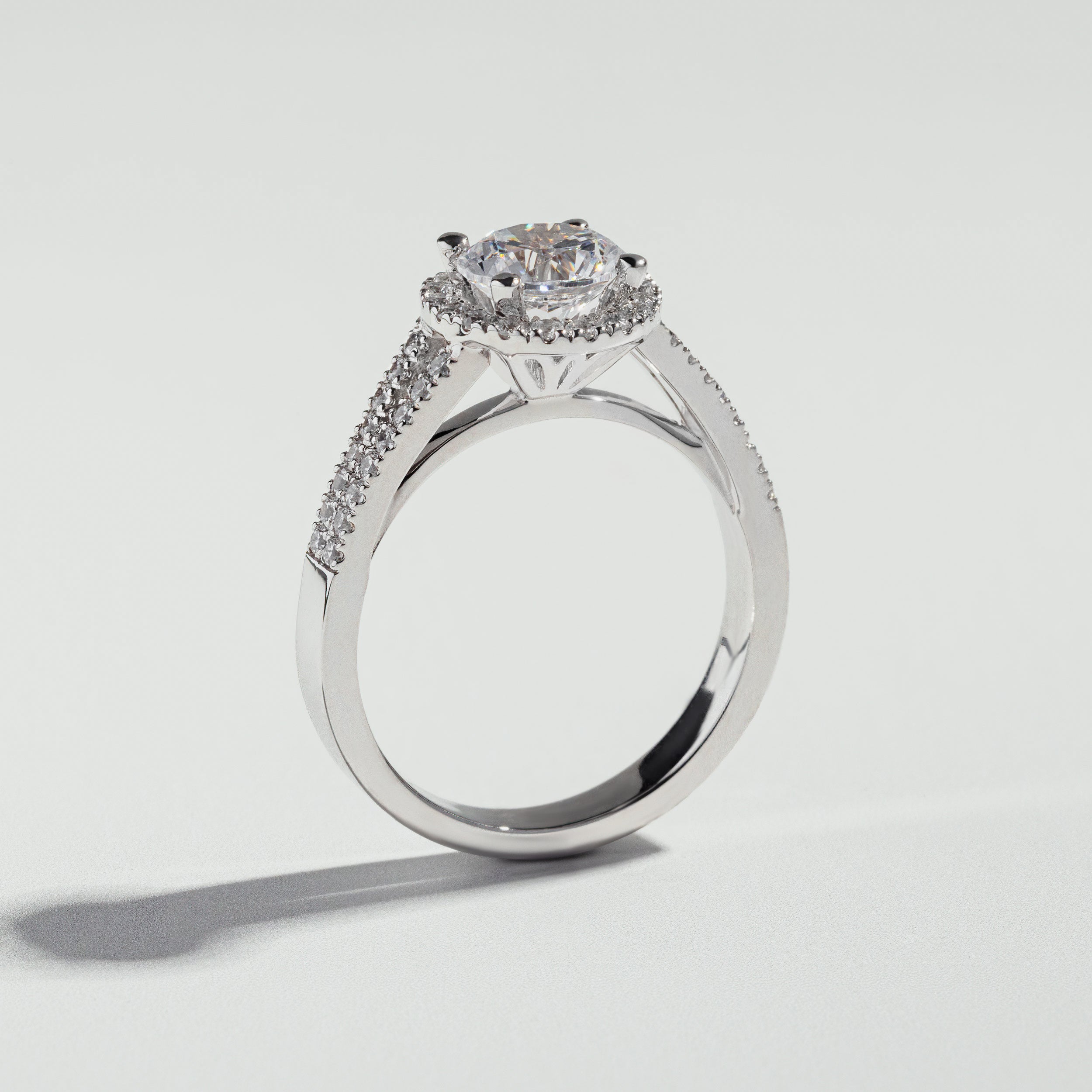 The Round Cut Halo Basket and Pav√© Ring by Atelier RMR Montreal