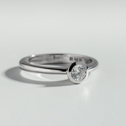 The Round Cut Bezel Diamond Ring