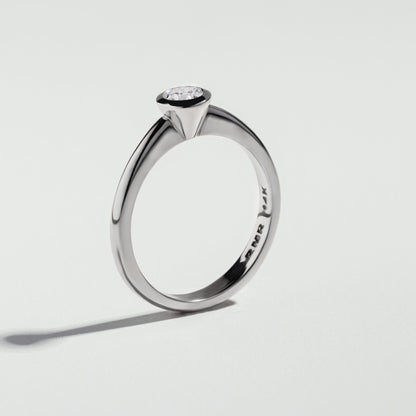 The Round Cut Bezel Diamond Ring