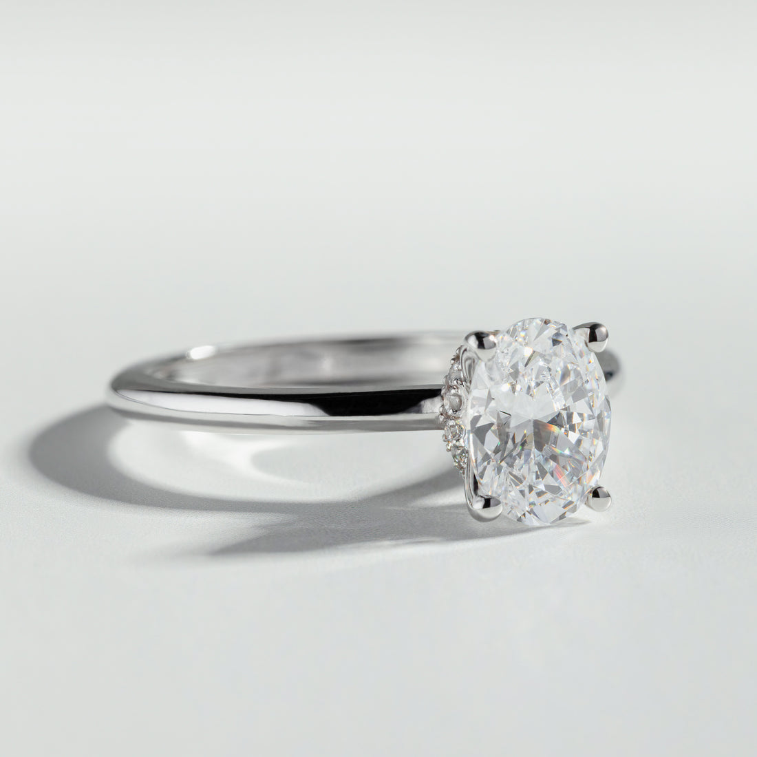 The Oval Cut Hidden Halo Diamond Ring by Atelier RMR Montreal