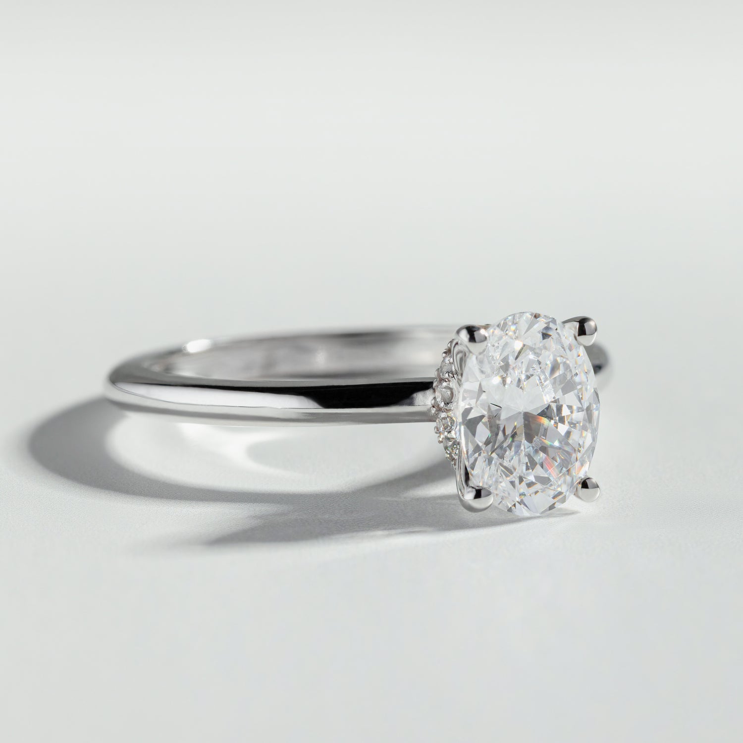 The Oval Cut Hidden Halo Diamond Ring by Atelier RMR Montreal