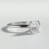 The Oval Cut Hidden Halo Diamond Ring by Atelier RMR Montreal