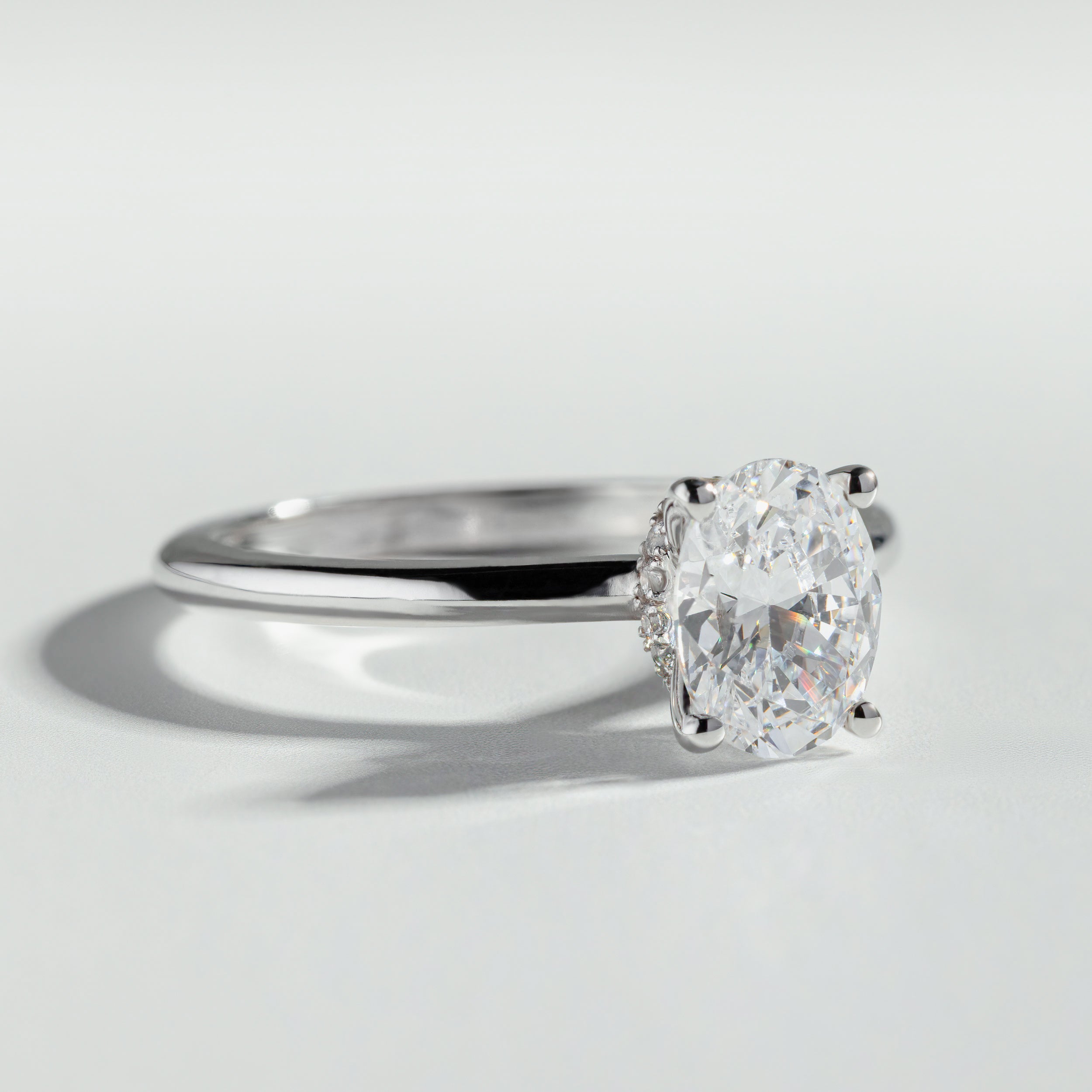 The Oval Cut Hidden Halo Diamond Ring by Atelier RMR Montreal