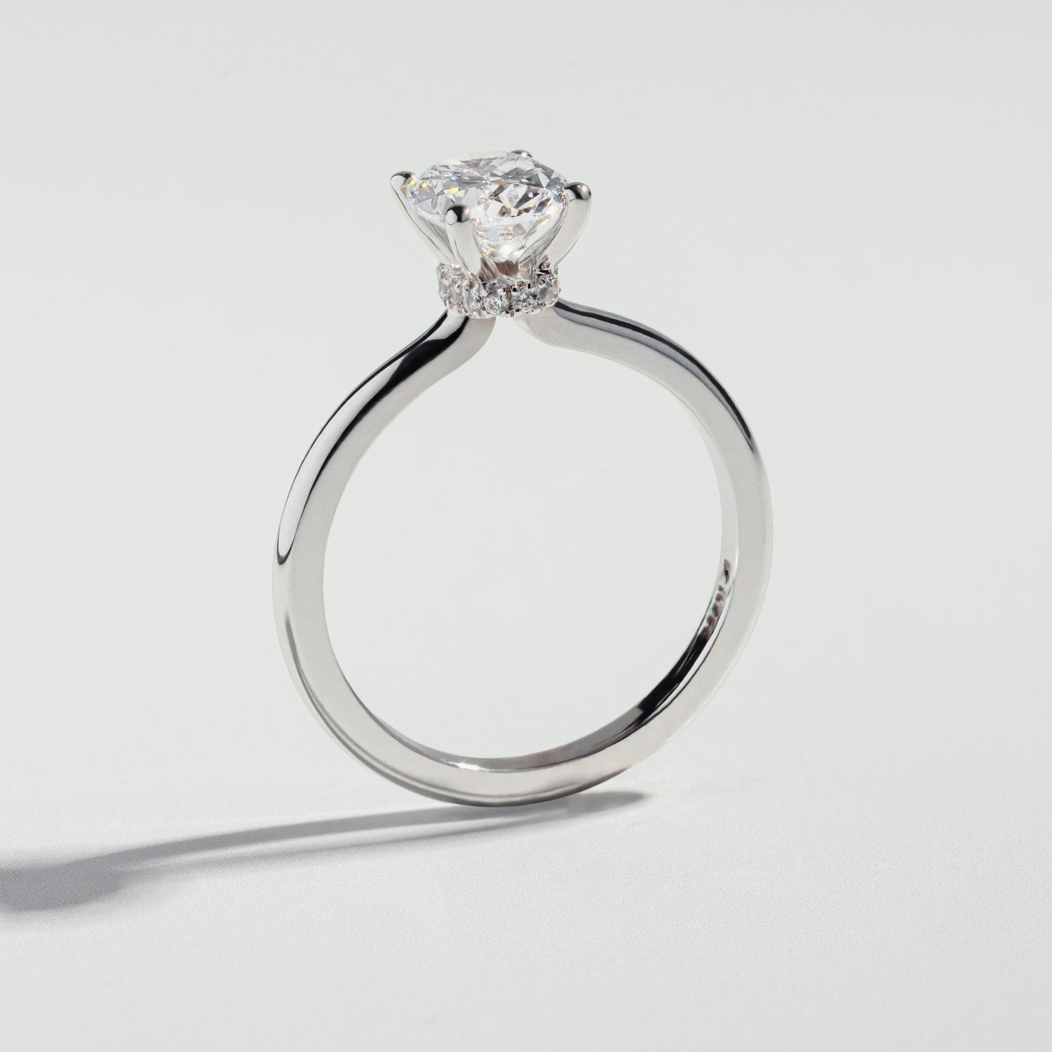 The Oval Cut Hidden Halo Diamond Ring by Atelier RMR Montreal
