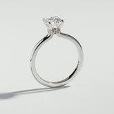 The Oval Cut Hidden Halo Diamond Ring by Atelier RMR Montreal