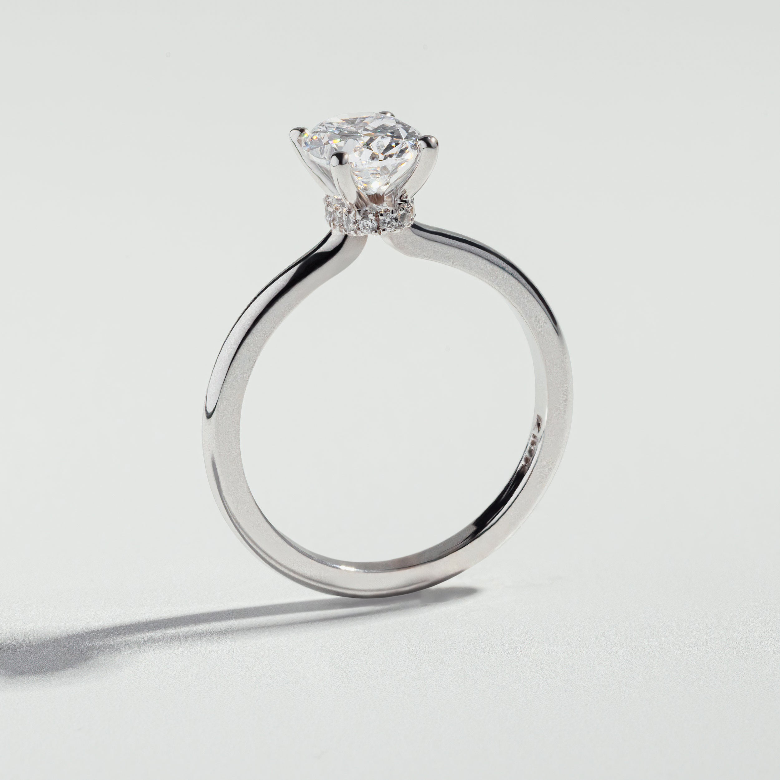 The Oval Cut Hidden Halo Diamond Ring by Atelier RMR Montreal