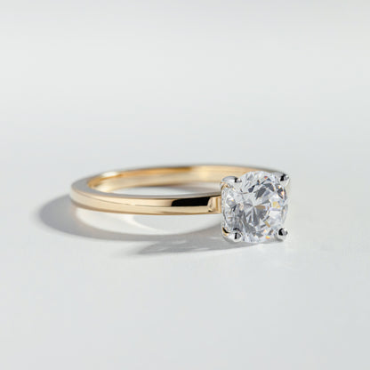 Bague solitaire classique à diamant rond de 1 carat