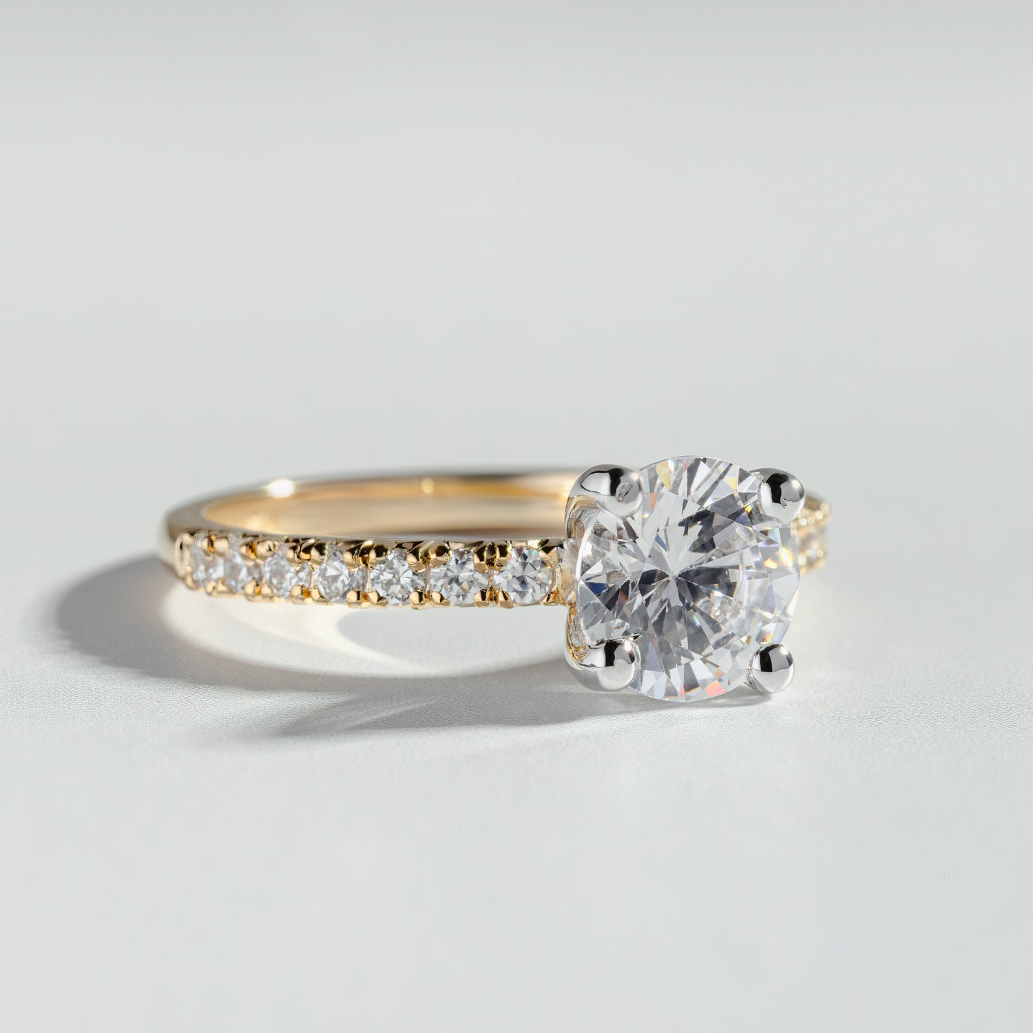 The Round Cut Diamond Pavé Two-Tone Ring