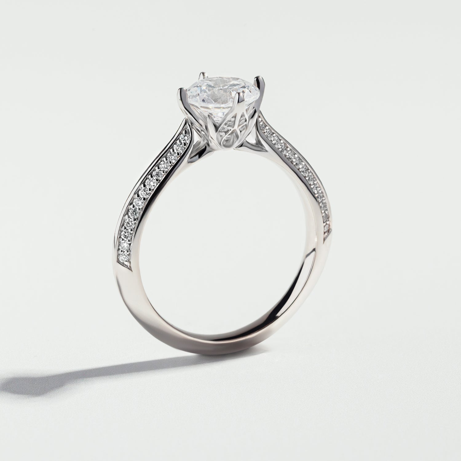 The Round Cut Knife Edge Pavé Diamond Ring