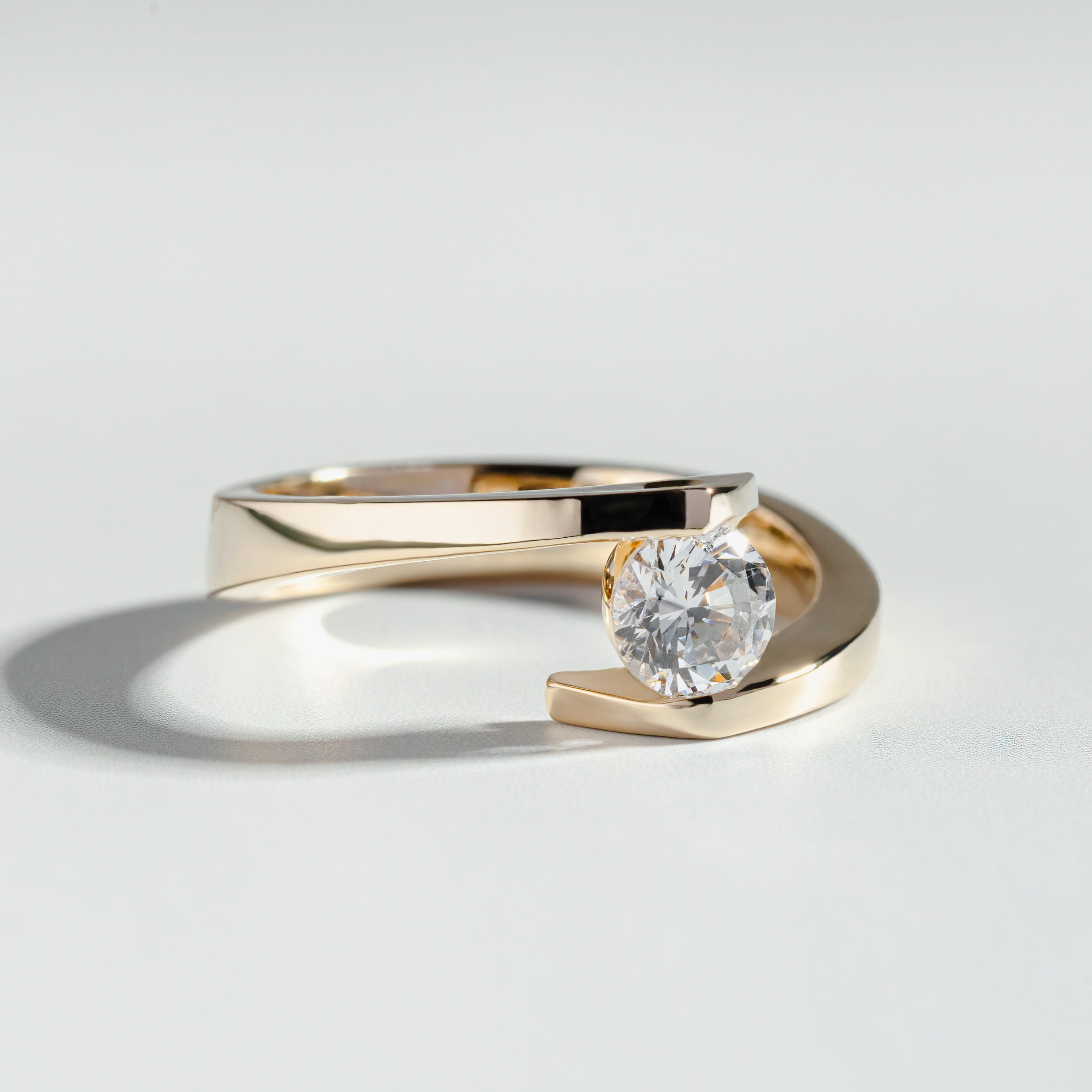 The Round Cut Tension Set Diamond Ring by Atelier RMR Montreal
