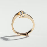 The Round Cut Tension Set Diamond Ring by Atelier RMR Montreal