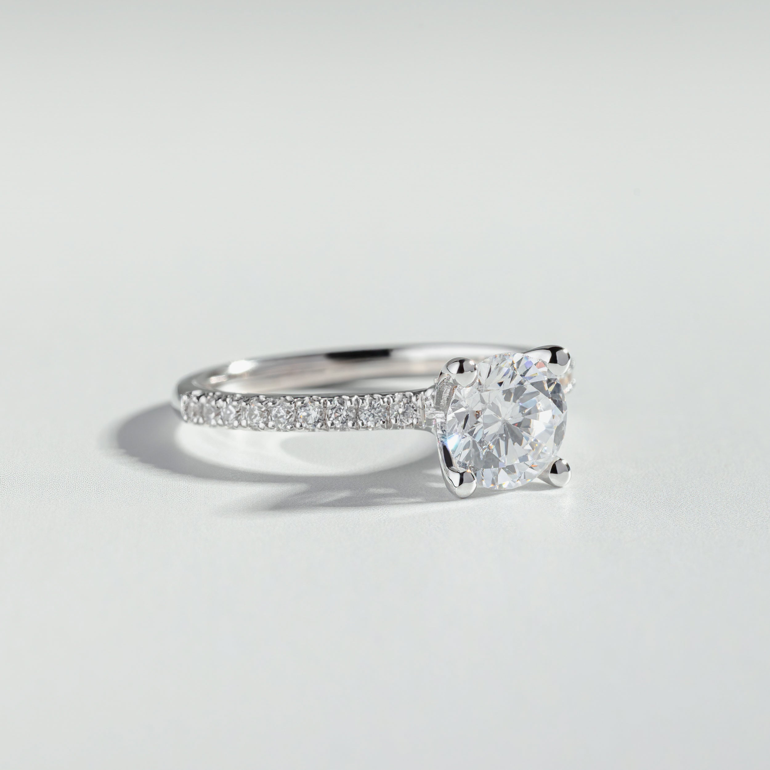 The Round Cut Diamond Solitaire and Pavé Ring