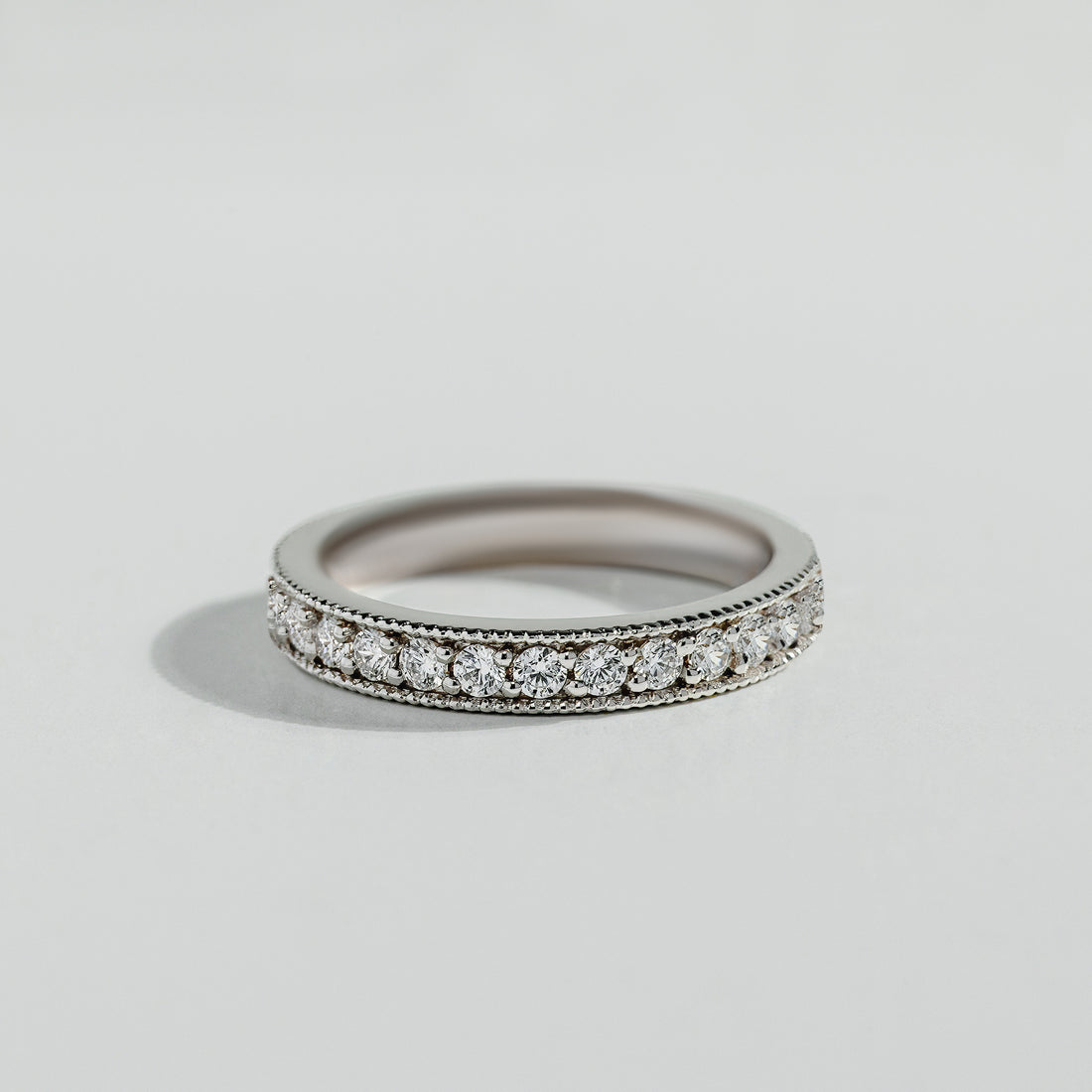The Round Cut Semi-Eternity Band Diamond Ring