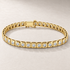 Bracelet TN03 en or jaune, diamants clairs, fond pierre greige — TN03 yellow gold bracelet with clear diamonds on greige stone.