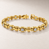 Bracelet TN18 en or jaune, diamants clairs, fond pierre greige — TN18 yellow gold bracelet with clear diamonds on greige stone.