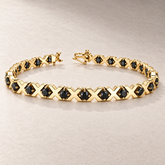 TN21 — Or jaune / Yellow gold — Diamants noirs / Black diamonds