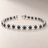 TN21 — Or blanc / White gold — Diamants noirs / Black diamonds