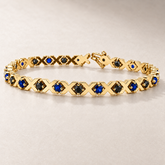 TN21S — Or jaune / Yellow gold — Saphirs bleus et diamants noirs / Blue sapphires and black diamonds — rendu illustratif / illustrative rendering