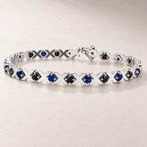 TN21S — Or blanc / White gold — Saphirs bleus et diamants noirs / Blue sapphires and black diamonds — rendu illustratif / illustrative rendering