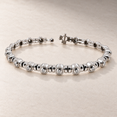 TN22 — Or blanc / White gold — Diamants clairs / Clear diamonds