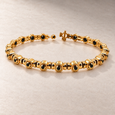 TN22 — Or jaune / Yellow gold — Diamants noirs / Black diamonds