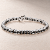 TN23 — Or blanc / White gold — Diamants noirs / Black diamonds
