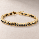 TN26 — Or jaune / Yellow gold — Diamants noirs / Black diamonds