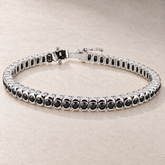 TN26 — Or blanc / White gold — Diamants noirs / Black diamonds