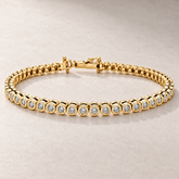 TN28 — Or jaune / Yellow gold — Diamants clairs / Clear diamonds