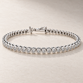 TN28 — Or blanc / White gold — Diamants clairs / Clear diamonds