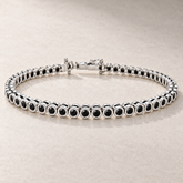 TN28 — Or blanc / White gold — Diamants noirs / Black diamonds