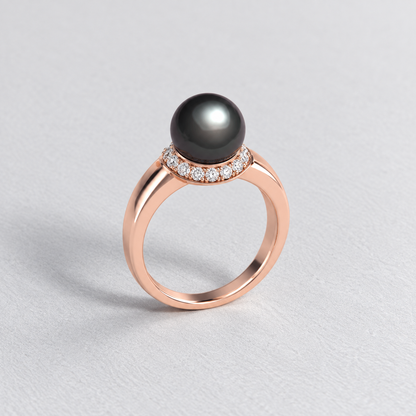 Bague en or avec perle de Tahiti et halo de diamants