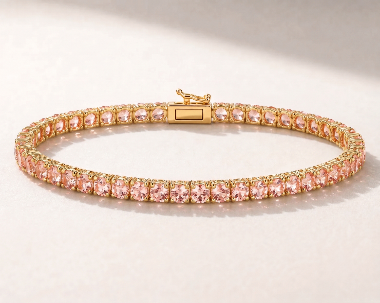 14K gold lab sapphire tennis bracelet in Pink Sapphire