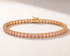 14K gold lab sapphire tennis bracelet in Pink Sapphire