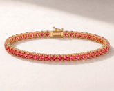 14K gold lab sapphire tennis bracelet in Padparadscha