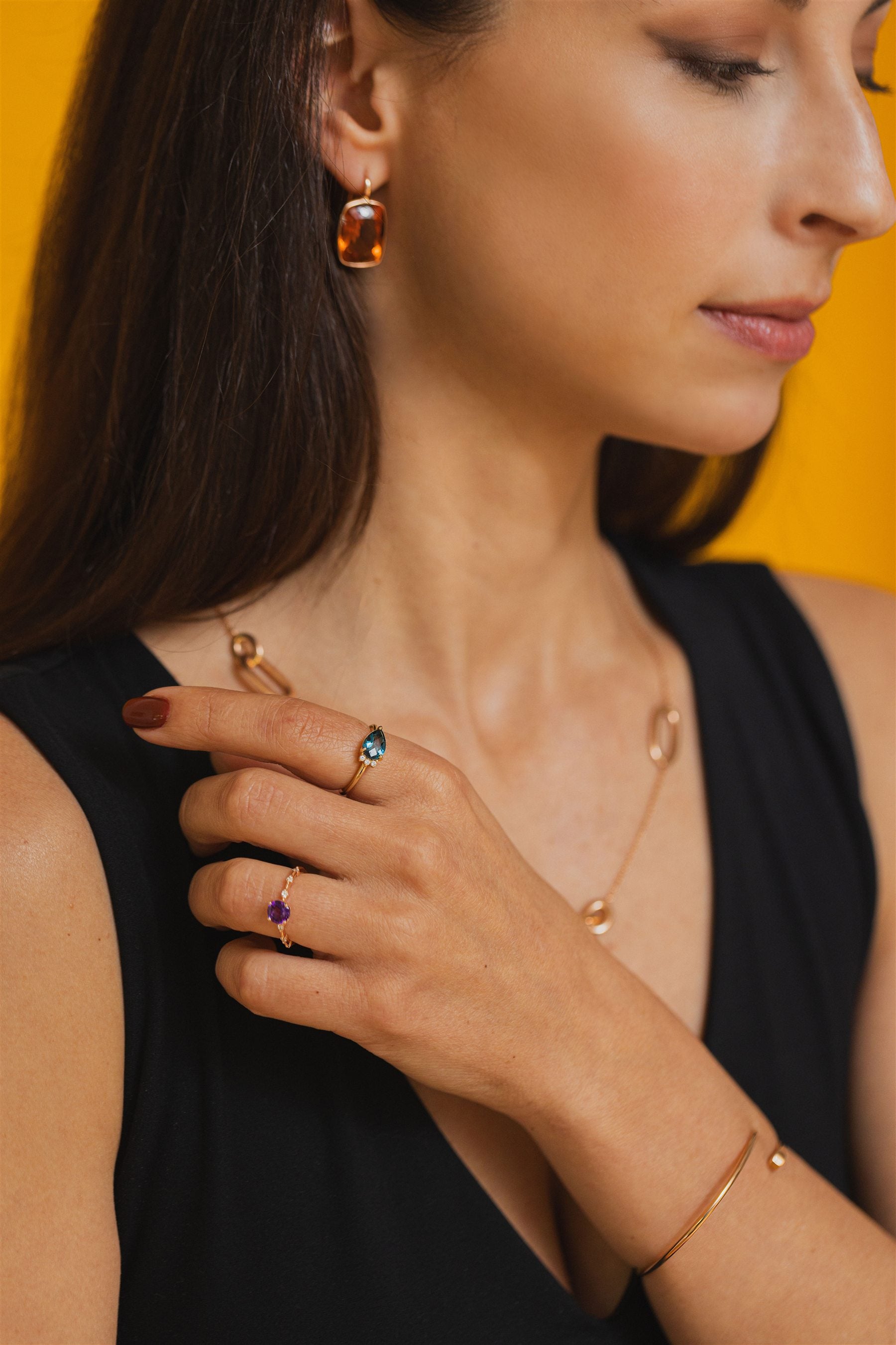 Atelier RMR jewellery and coloured gemstones worn in portrait